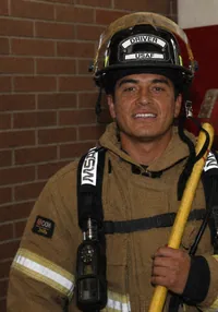 David Vargas, founder of Early Responders, in firefighter gear